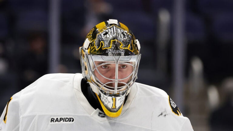 Boston Bruins goaltender Jeremy Swayman (1) reacts in the second period of an NHL hockey game against the New York Islanders, Wednesday, Nov. 26, 2025, in Elmont, N.Y.