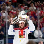 Czech Republic's David Pastrnak celebrates with their trophy after they defeated Switzerland 2-0 in a gold medal match at the Ice Hockey World Championships in Prague, Czech Republic, Sunday, May 26, 2024.