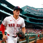 Boston Red Sox right fielder Roman Anthony runs onto the field for warmups before facing the Kansas City Royals at Fenway Park on Aug. 6, 2025.