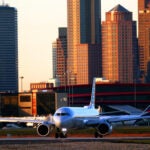 The flight landed unexpectedly at Logan Airport after the student allegedly stabbed two passengers with a metal fork.