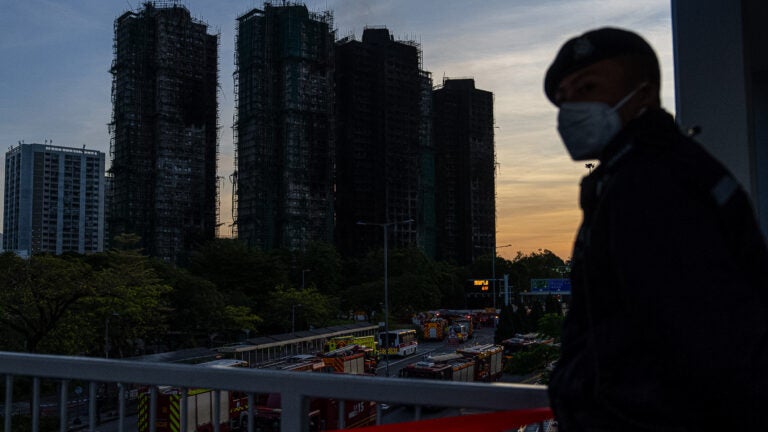 Burned buildings are seen at the scene of the fire at Wang Fuk Court, a residential estate in the Tai Po district of Hong Kong's New Territories.