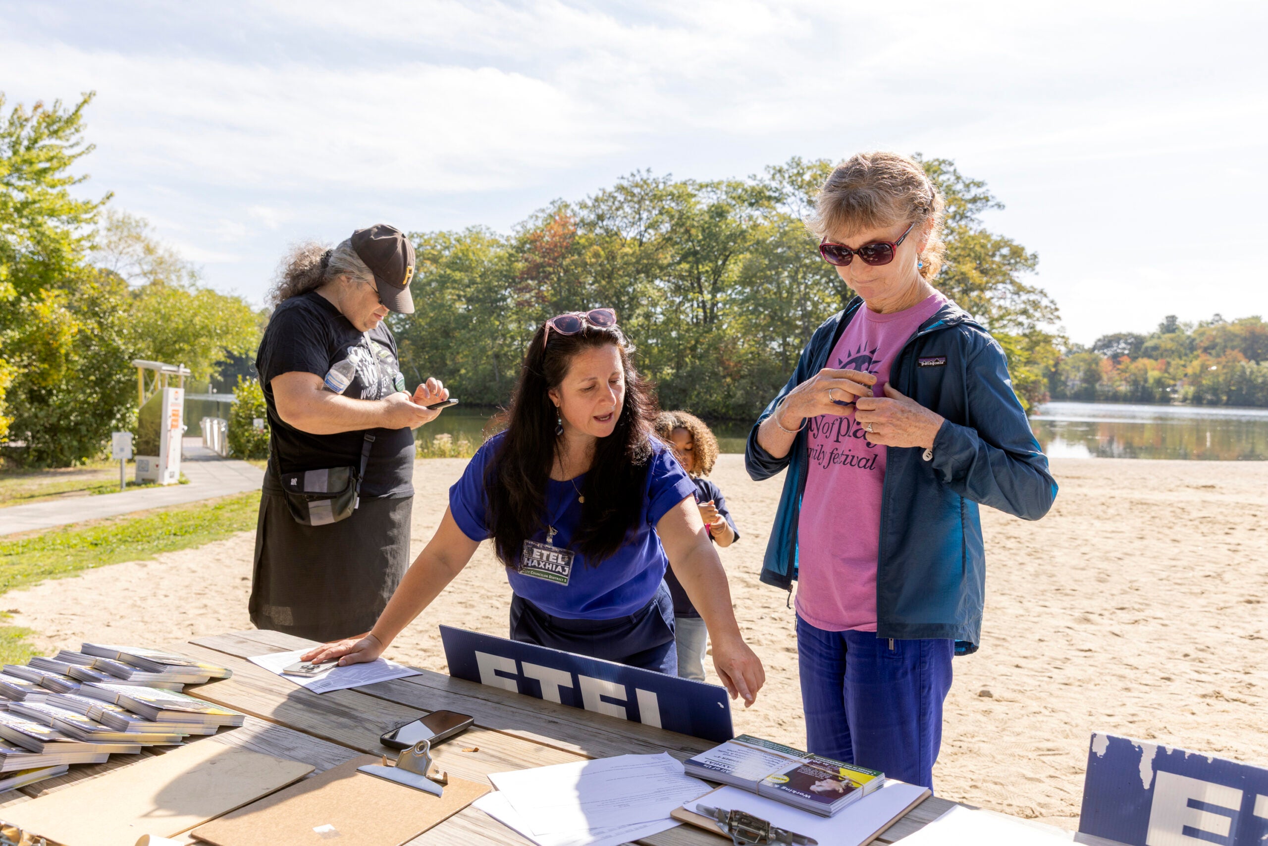 Etel Haxhiaj, a member of the City Council, center, prepares to canvass for reelection on Sept. 27, 2025, in Worcester, Mass. 
