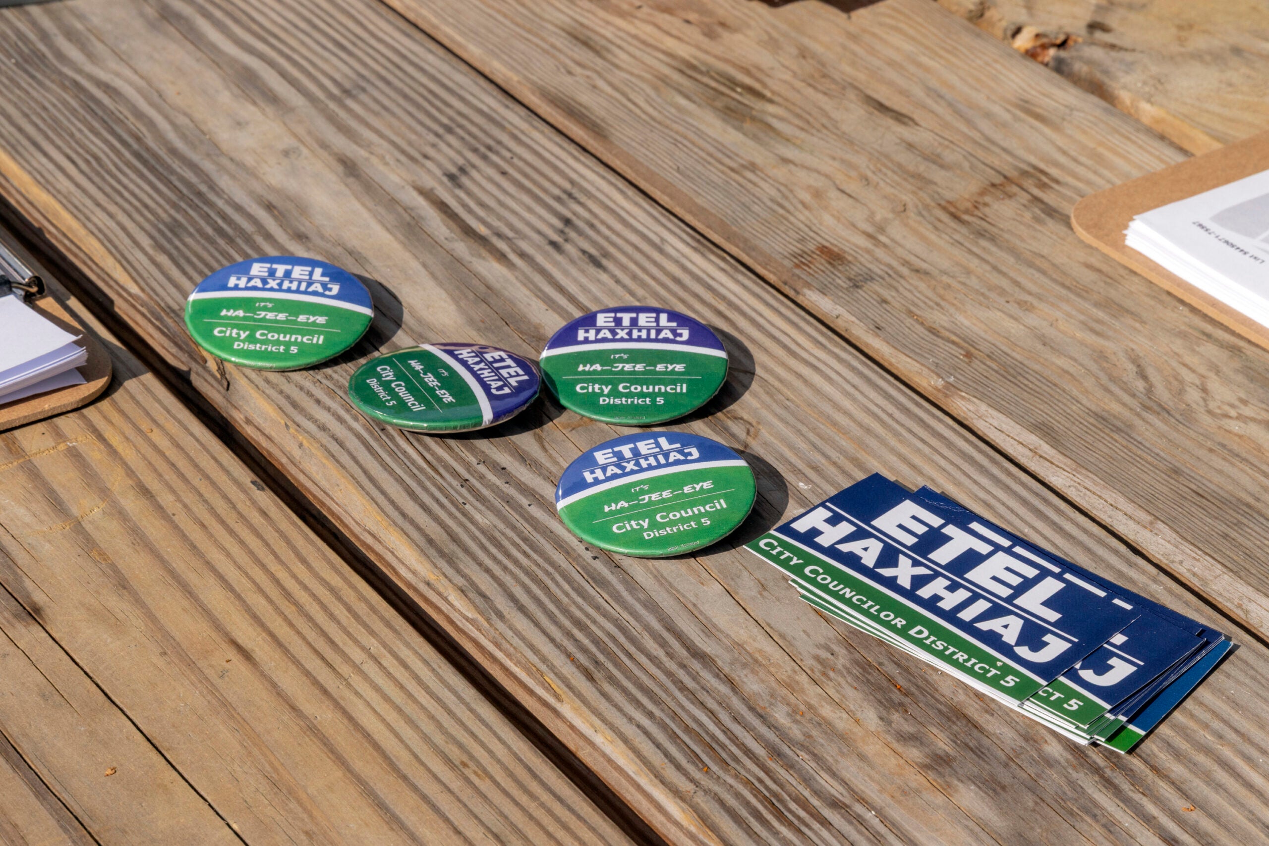 Campaign paraphernalia is laid out as Etel Haxhiaj, a member of the City Council, and supporters prepare to canvass for reelection. 