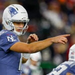 New England Patriots quarterback Drake Maye (10) points to the defense during the first half of an NFL football game against the New York Jets, Thursday, Nov. 13, 2025, in Foxborough, Mass.