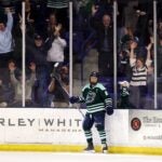 LOWELL, MASSACHUSETTS - FEBRUARY 16: Hilary Knight #21 of Boston Fleet celebrates with fans after scoring a goal against the Minnesota Frost during the third period at Tsongas Center on February 16, 2025 in Lowell, Massachusetts. The Fleet defeat the Frost 4-2.