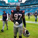 New England Patriots defensive end Milton Williams (97) walks off the field after making a pivital sack late in the (4th quarter) against the Miami Dolphins Sunday September 14, 2025 at Hardrock stadium in Miami Gardens, FL.