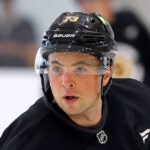 The Boston Bruins held training camp Thursday at the Warrior Ice Arena. Charlie McAvoy skates up ice during a drill.