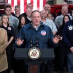 FILE - Vice President JD Vance, right, and Ohio Gov. Mike DeWine, left, listen as Environmental Protection Agency administrator Lee Zeldin, center, speaks in East Palestine Fire Station on Feb 3, 2025, in East Palestine, Ohio, Feb. 3, 2025.