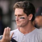 Roman Anthony #19 of the Boston Red Sox celebrates scoring on Romy Gonzalez #23 single in the ninth inning during a baseball game against the Baltimore Orioles at Oriole Park at Camden Yards on August 28, 2025 in Baltimore, Maryland.