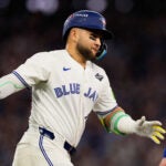 Toronto Blue Jays' Bo Bichette celebrates his three run home run against the Los Angeles Dodgers during the third inning in Game 7 of baseball's World Series, Saturday, Nov. 1, 2025, in Toronto.